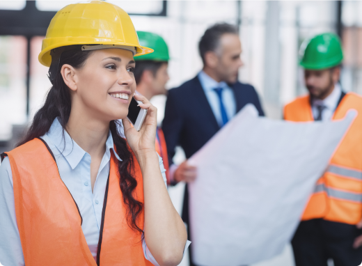 Construction engineer reviewing site plans and specifications